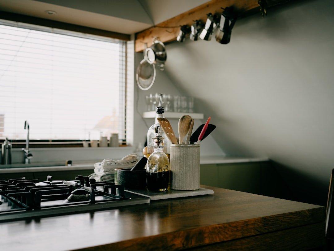 Kitchen counter with cooking utensils and stove